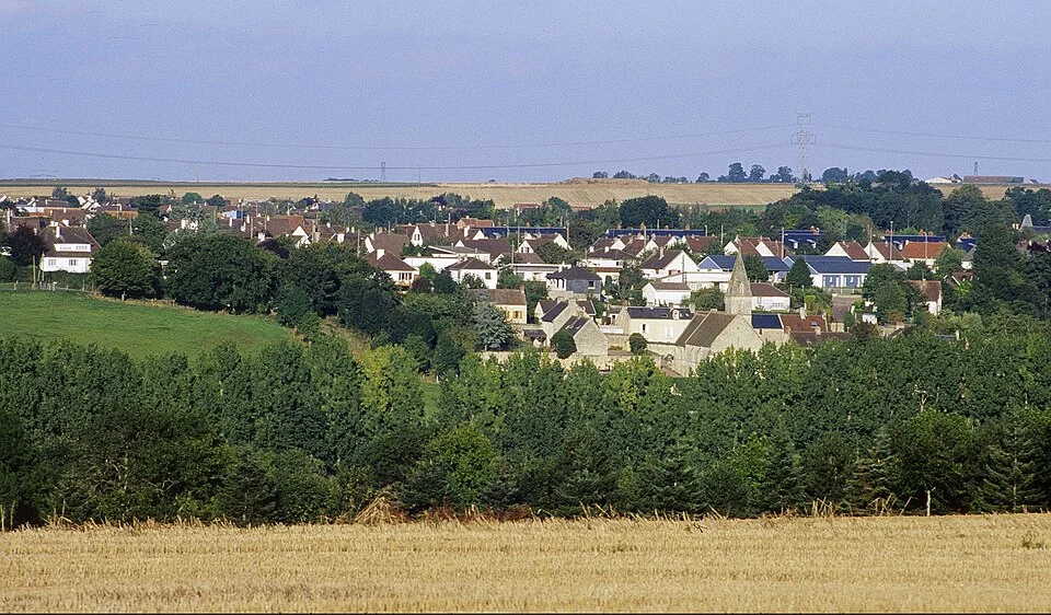 Vue du village de Saint-André-sur-Orne. Les locaux provisoires de la bibliothèque derrière la mairie ne sont pas représentés.